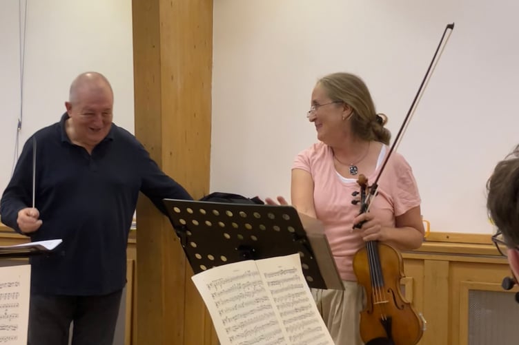 Selina Hamilton being congratulated on her performance of Mozart 5th violin concerto (1st movement)