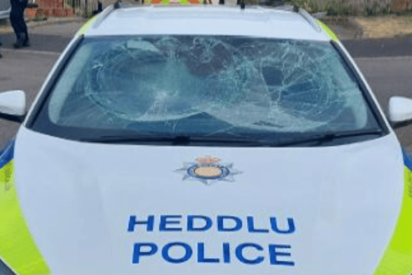 A police car that has been vandalised