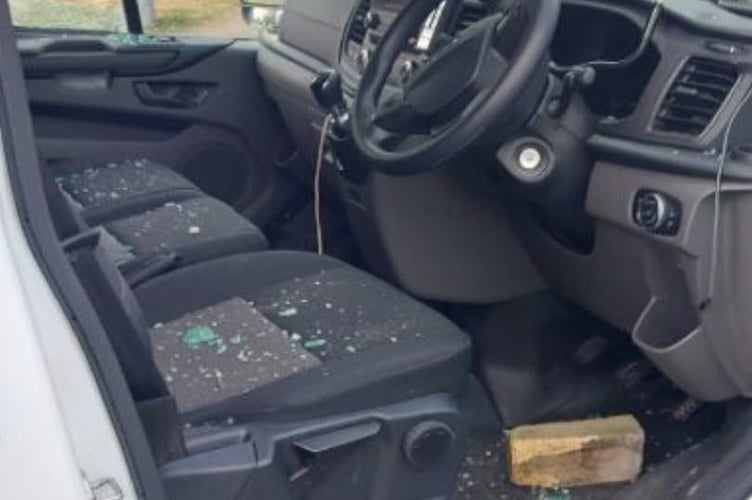The brick thrown through the window