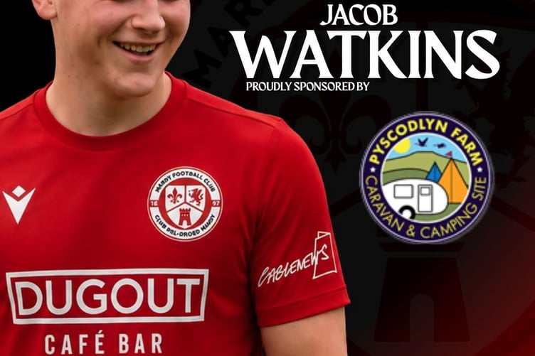 Smiling through, but it was no laughing matter for Jake Watkins after a clash of heads with team-mate Stephen Dempsey